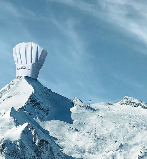 Schneebedeckter Berggipfel mit Kochmütze unter blauem Himmel | © Kitzsteinhorn 