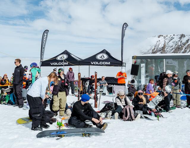 Winter gathering of snowboarders and skiers