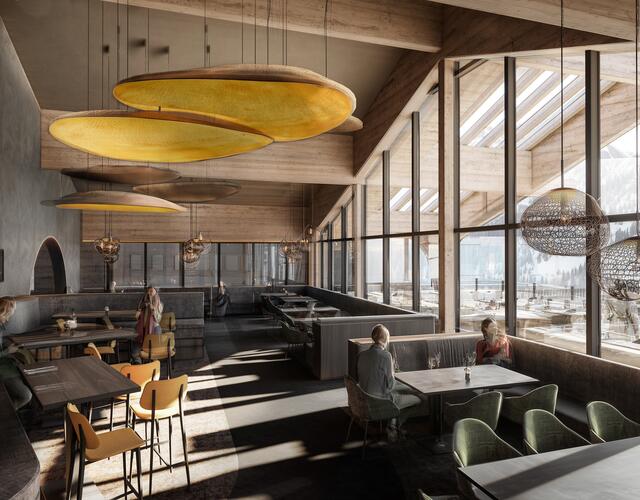 Innenansicht eines Restaurants mit großen Fenstern und gelben Lampen über Tischen und Sitzbänken