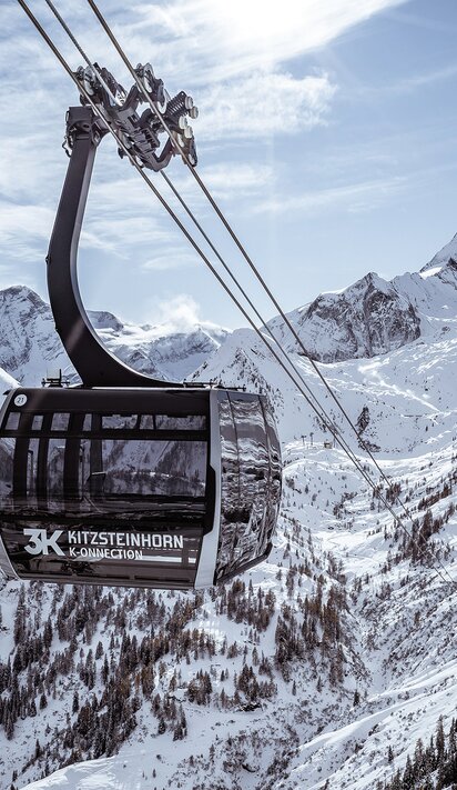 3K Kitzsteinhorn Gondel vor verschneiter Berglandschaft